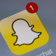 The logo of mobile app Snapchat is displayed on a tablet in Paris Jan. 2, 2014.
LIONEL BONAVENTURE/AFP/Getty Images